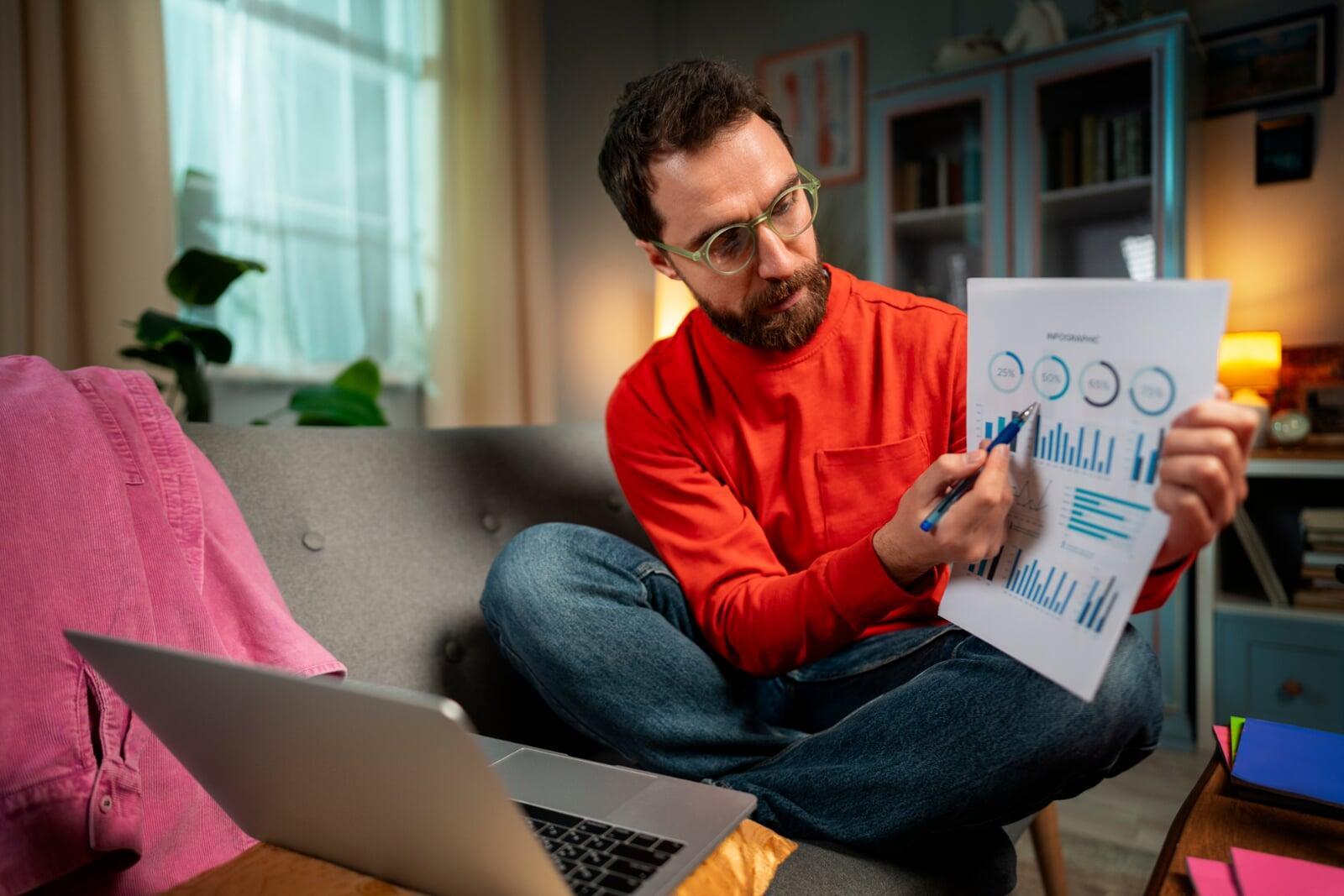 Team member reviewing conversion metrics on a laptop.